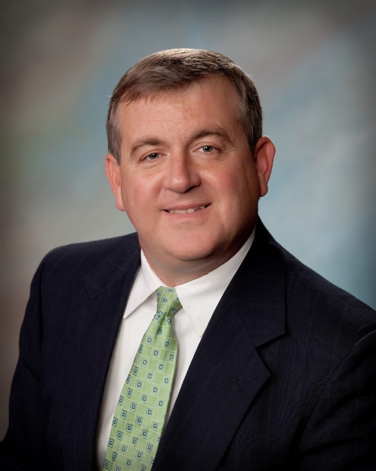 A man posing for a photo