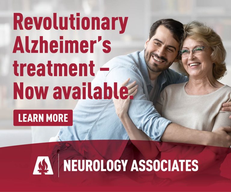 A young man hugging an older woman